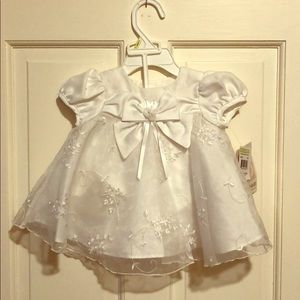 Beautiful embroidered white dress by Bonnie Baby.